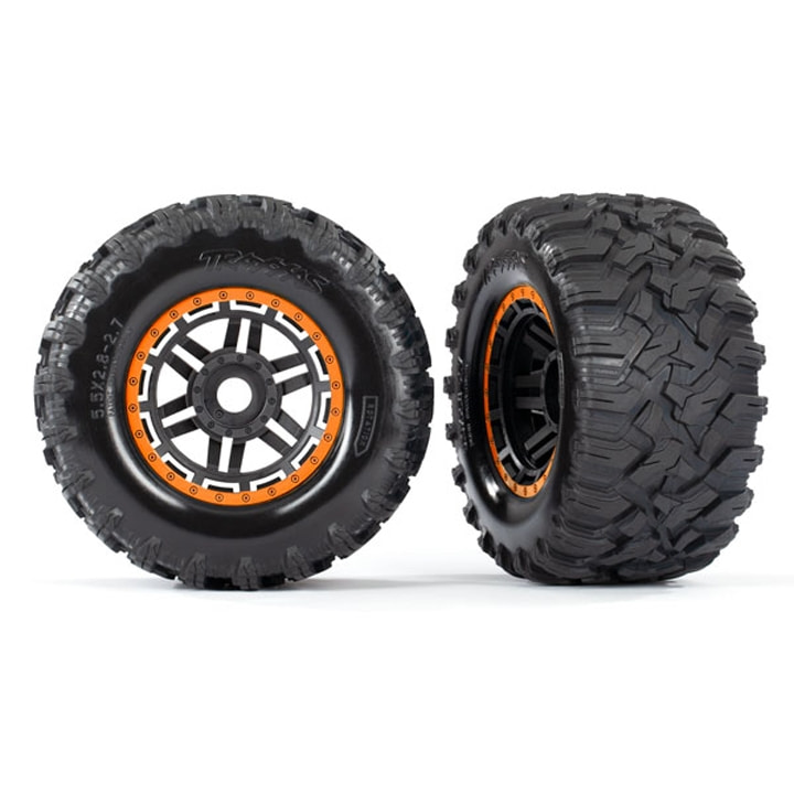 AX8972T Tires &amp; wheels, assembled, glued (black, orange beadlock style wheels, Maxx® MT tires, foam inserts) (2) (17mm splined) (TSM® rated)